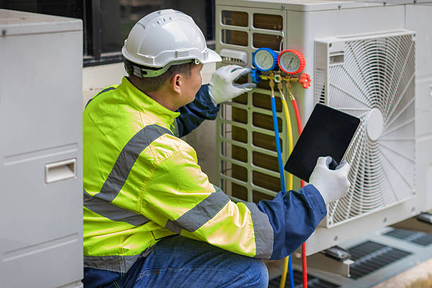 Professional Ac Installation technician working in Schodack Landing, NY